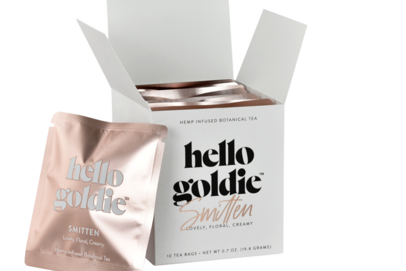 hello goldie smitten cbd tea in white box with pink foil wrapper